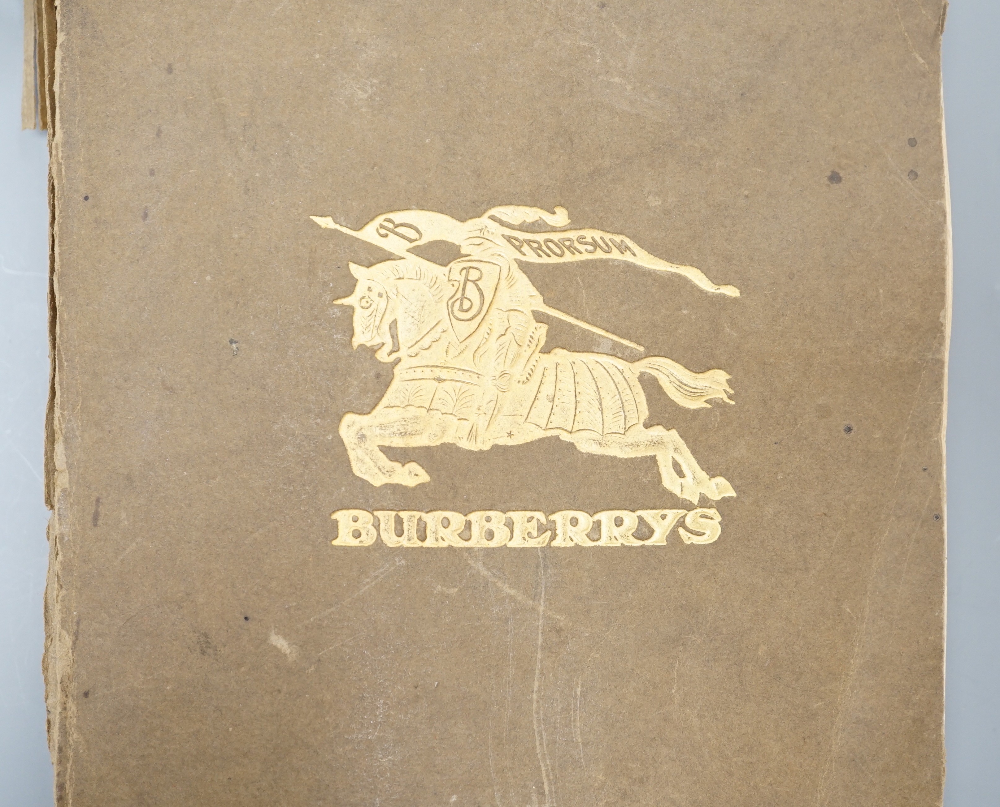 Burberry - Burberry For Men, 19th edition, elongated qto, 256 pages, many mounted with cloth swathes, Burberry gilt coat of arms to front cover, London c.1909